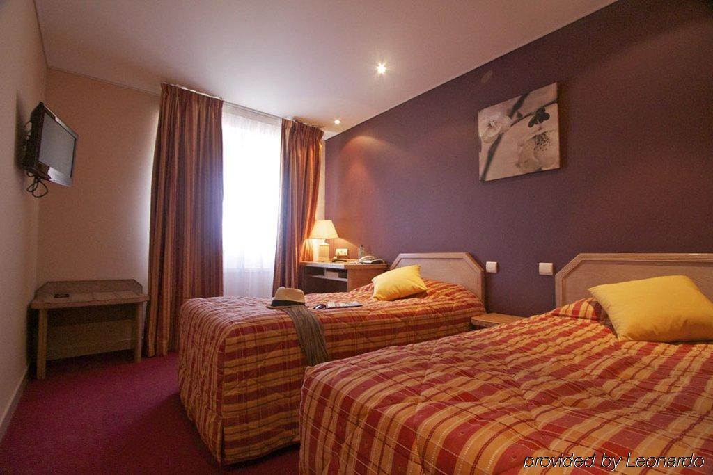 Brit Hotel Les Voyageurs Loudéac Pokoj fotografie